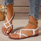 Women’s braided strap summer sandals on white background